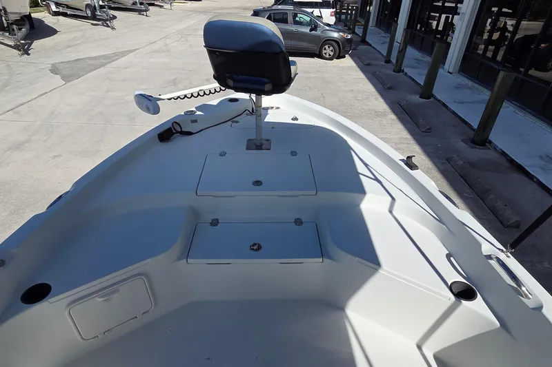 Slide: The Image of 2005 Sailfish 1900 BB Bay Boat deck with seating and storage compartments. - 4