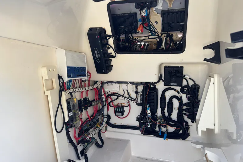 Slide: The Image of Electrical wiring and components inside a 2014 Boston Whaler 270 Vantage boat. - 25