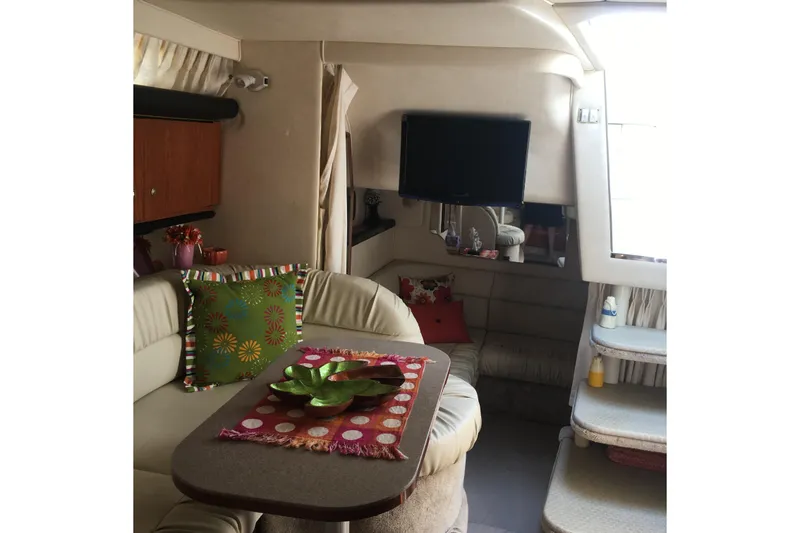 Slide: The Image of Dinette on stbd looking aft to mid cabin and companionway on port to aft deck - 16