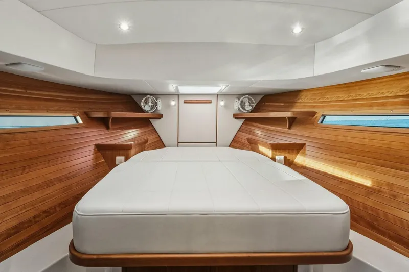 Slide: The Image of Luxurious interior of 2025 MJM 42 yacht with wooden accents and modern lighting. - 17