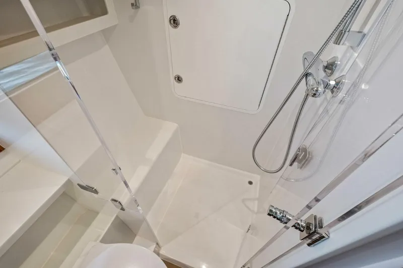 Slide: The Image of Modern shower area in 2025 MJM 42 yacht, featuring sleek fixtures and glass door. - 20
