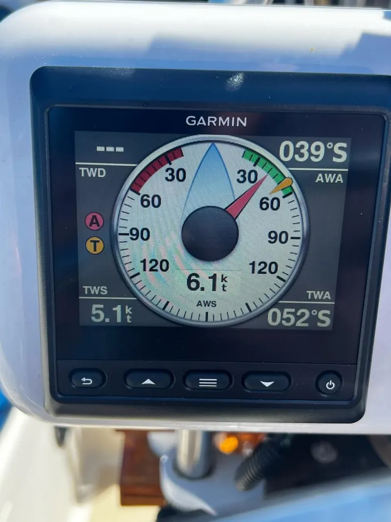 Slide: The Image of Garmin marine instrument display showing wind speed and direction on a 1982 O'Day 28 sailboat. - 18