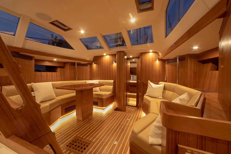 Slide: The Image of Manufacturer Provided Image: Luxurious interior of 2025 Hylas H48 yacht with elegant wood finish and plush seating. - 8