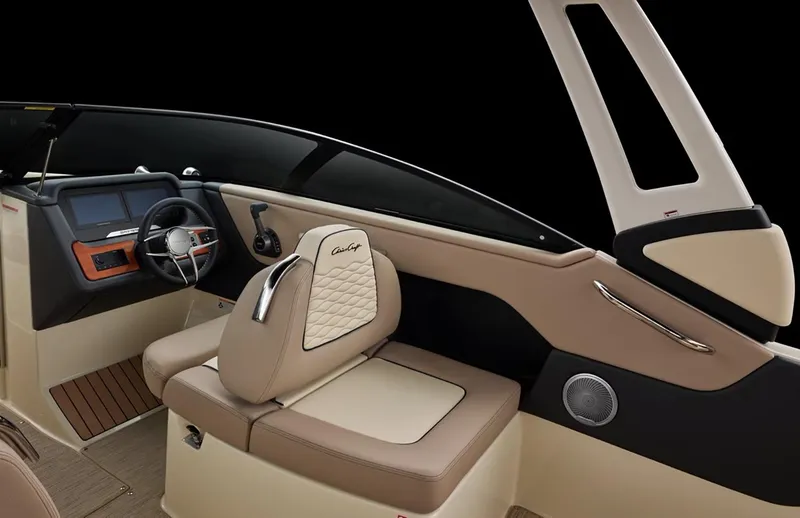 Slide: The Image of Manufacturer Provided Image: 2025 Chris-Craft Sportster 25 boat interior with luxurious seating and modern dashboard. - 13