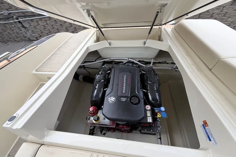Slide: The Image of 2026 Chris-Craft Sportster 25 engine compartment with Volvo Penta V8 engine. - 28