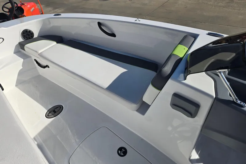 Slide: The Image of 2023 Tahoe T18 boat interior with seating and storage compartments. - 13