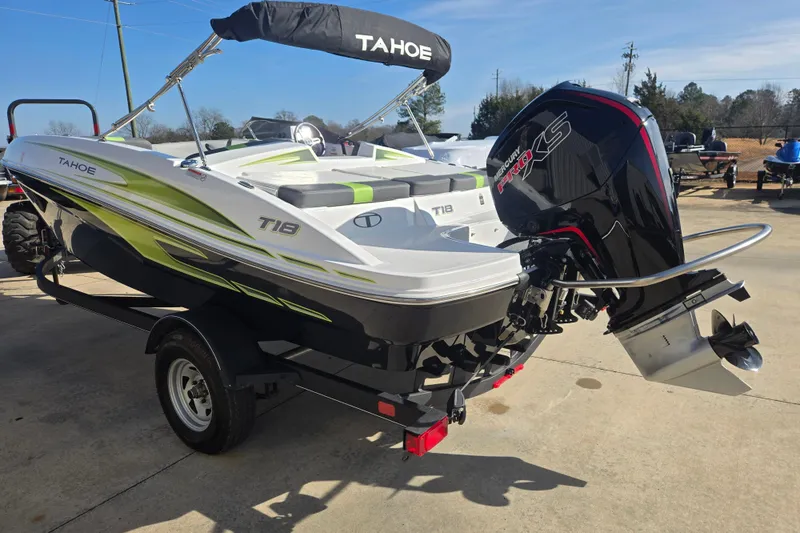 Slide: The Image of 2023 Tahoe T18 boat with Mercury Pro XS engine on a trailer. - 6
