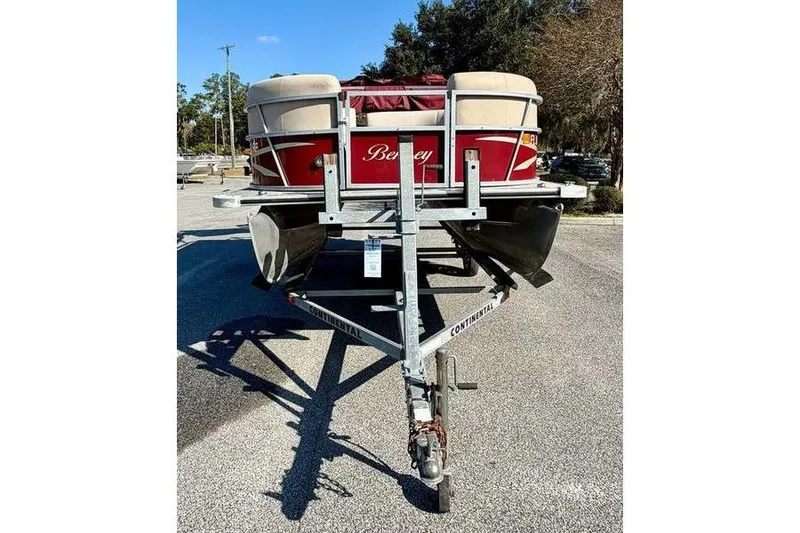 Slide: The Image of 2017 Bentley Pontoons 140 Cruise on trailer, parked outdoors, sunny day. - 2