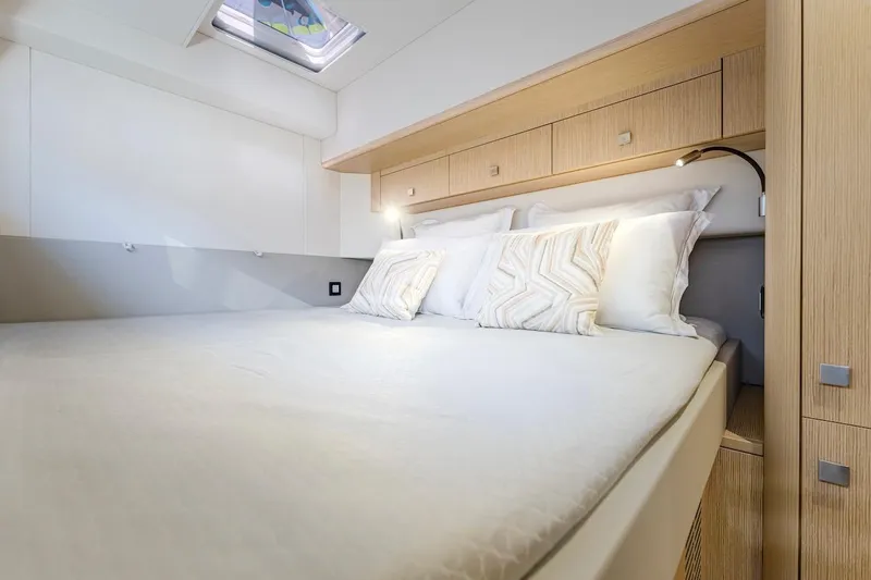 Slide: The Image of Luxurious bedroom in Privilege Signature 510 yacht, year 2025. - 23