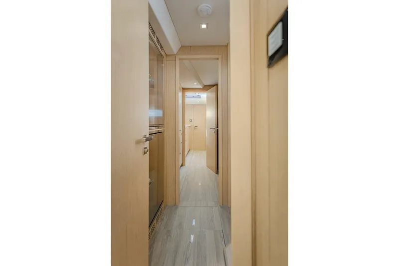 Slide: The Image of Interior of 2025 Privilege Signature 510, featuring modern wood finish. - 47