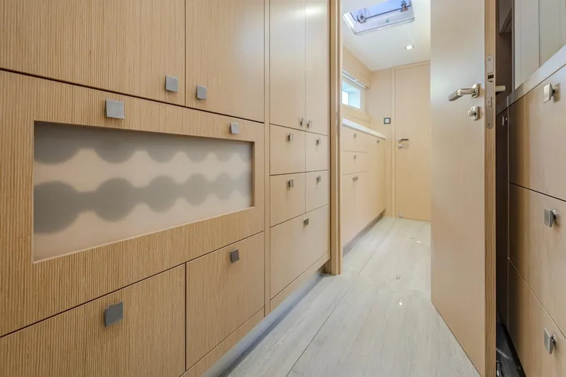 Slide: The Image of Interior of Privilege Signature 510 yacht, modern wooden cabinetry, 2025 model. - 49