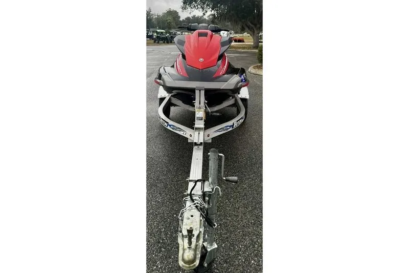 Slide: The Image of 2016 Yamaha WaveRunner VX Deluxe on trailer, parked on wet pavement. - 2