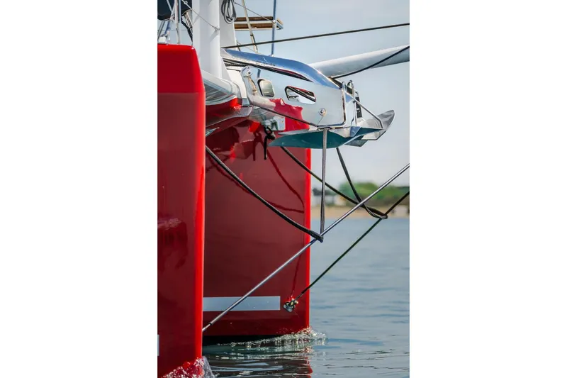 Slide: The Image of Red bow of Privilege Signature 510 catamaran, year 2025. - 7