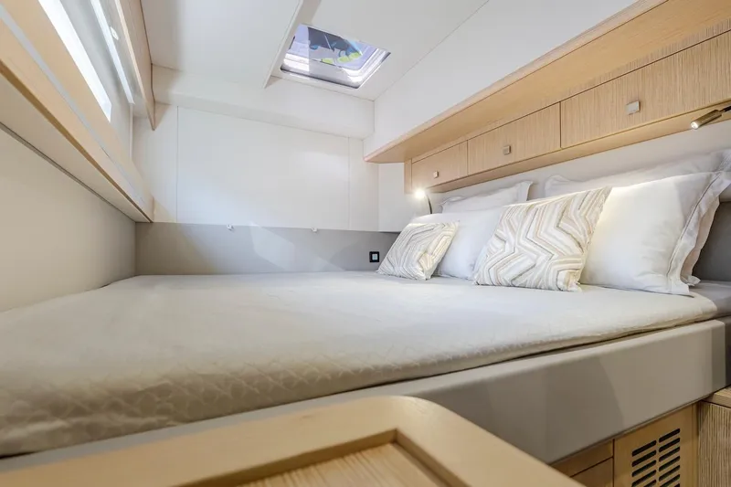 Slide: The Image of Luxurious bedroom in Privilege Signature 510 yacht, model year 2025. - 21