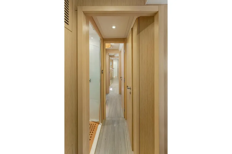 Slide: The Image of Interior of Privilege Signature 510, 2025 model, featuring wood paneling. - 29