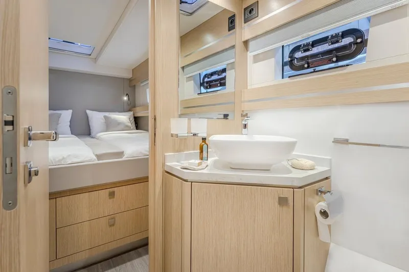 Slide: The Image of Luxurious bathroom and bedroom in Privilege Signature 510 yacht, year 2025. - 43