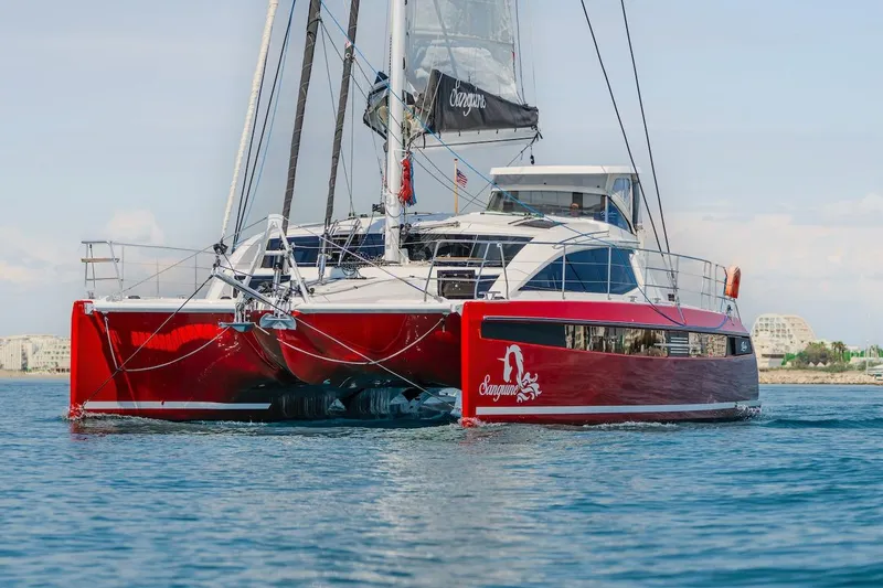 Slide: The Image of Red Privilege Signature 510 catamaran on water, year 2025. - 67