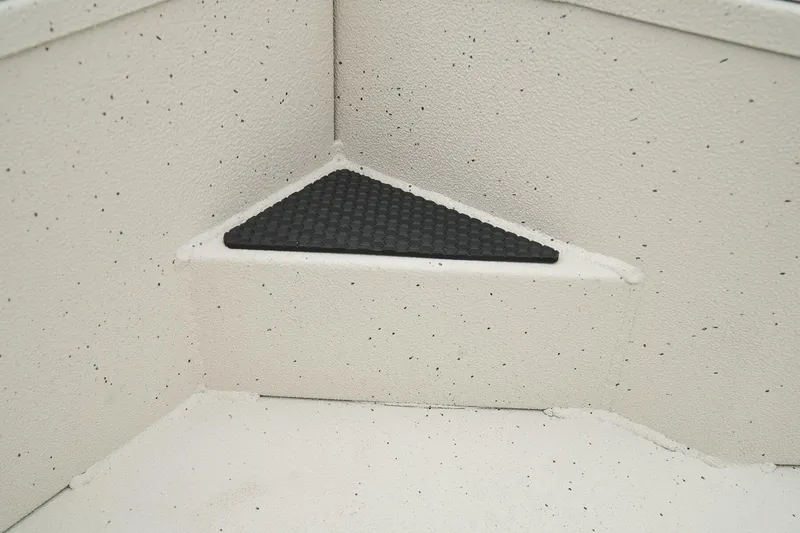 Slide: The Image of Manufacturer Provided Image: Interior of 2025 Ranger RB210 boat with non-slip triangular mat. - 26