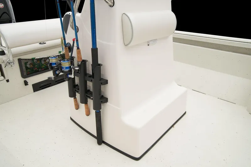 Slide: The Image of Manufacturer Provided Image: 2025 Ranger RB210 boat interior with fishing rod holders and storage. - 32