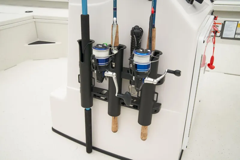 Slide: The Image of Manufacturer Provided Image: Fishing rods secured on a 2025 Ranger RB210 boat, showcasing onboard storage solutions. - 33