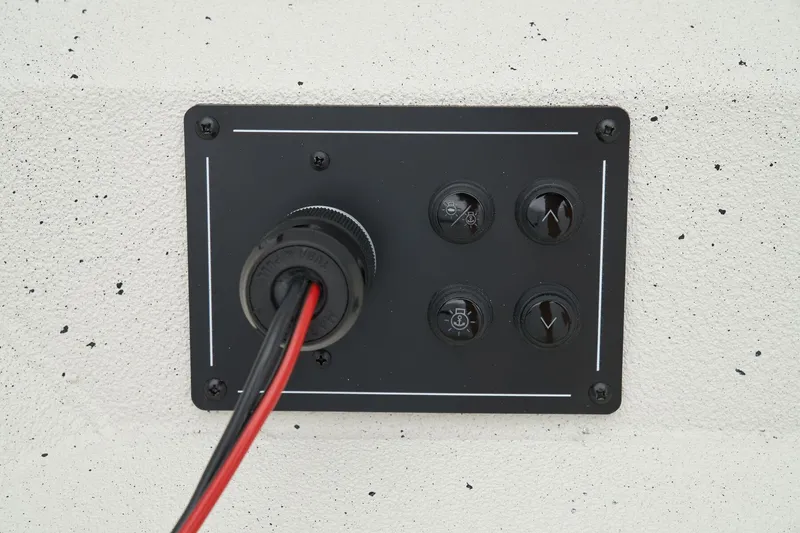 Slide: The Image of Manufacturer Provided Image: Electrical panel with cables, Ranger RB210 model, 2025, mounted on a white wall. - 37