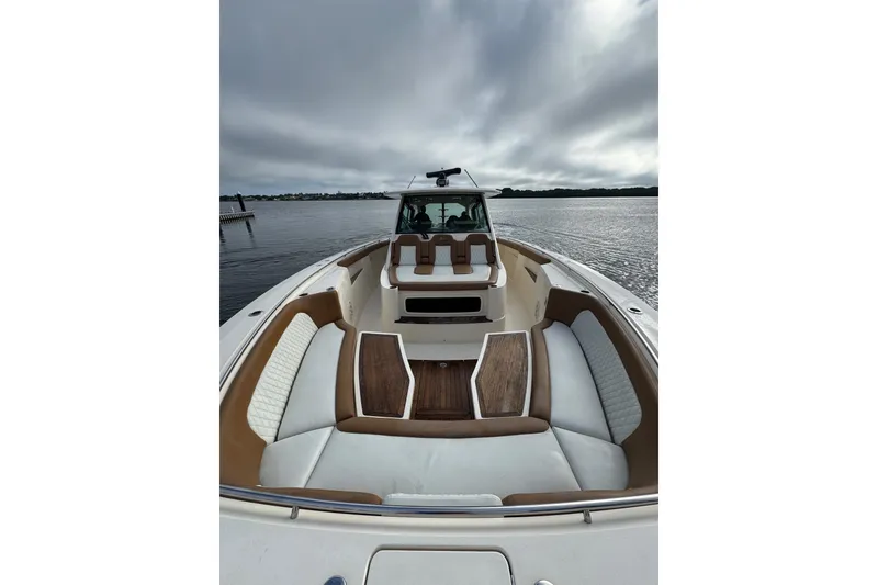 Slide: The Image of Modern kitchen area in 2020 Scout 530 LXF yacht with stove and microwave. - 19