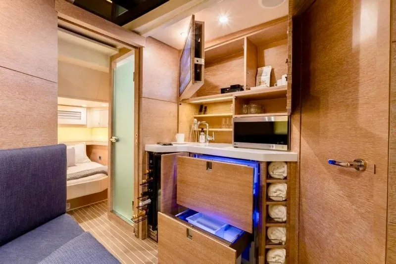 Slide: The Image of Interior of 2020 Scout 530 LXF boat with luxurious seating and scenic water view. - 22