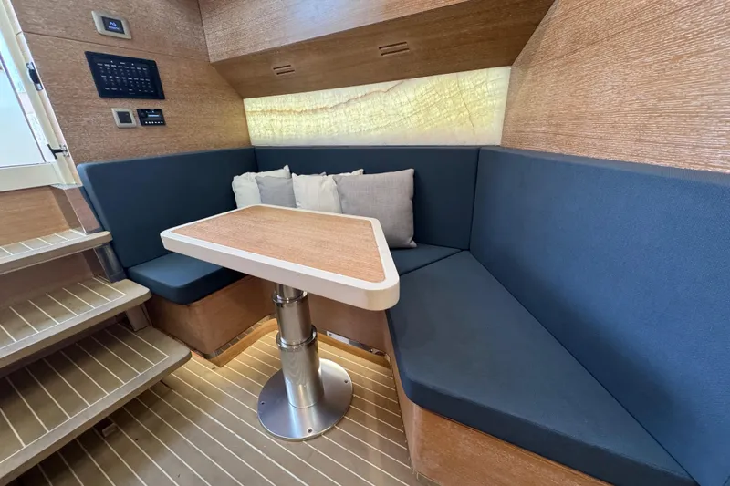 Slide: The Image of Interior view of 2020 Scout 530 LXF boat with sunroof and luxurious seating. - 23