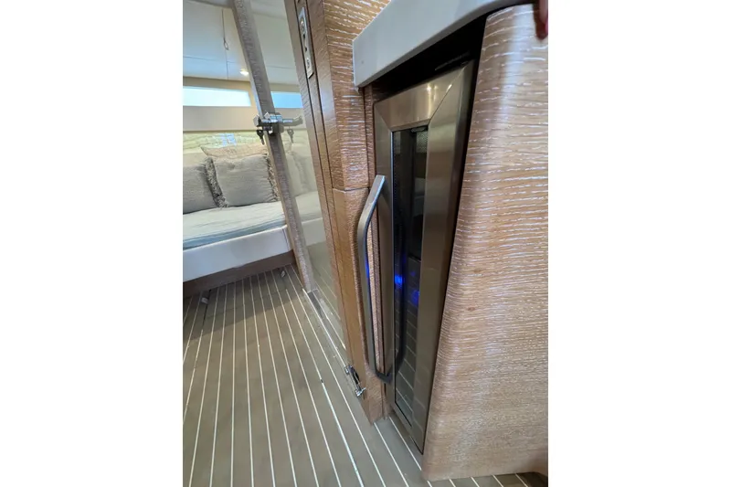 Slide: The Image of Luxurious interior of 2020 Scout 530 LXF yacht with modern seating and wood finish. - 26