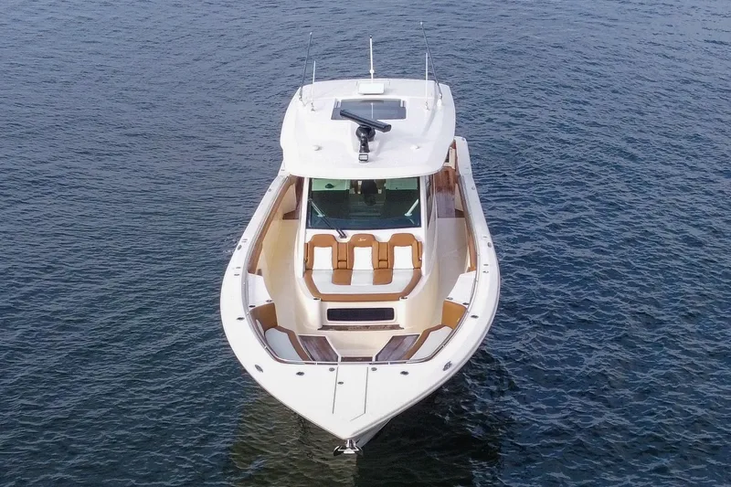 Slide: The Image of 2020 Scout 530 LXF luxury boat on open water, aerial view. - 5