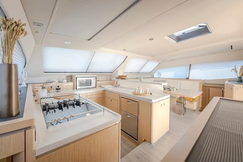 Slide: The Image of Luxurious kitchen on Privilege Signature 510 yacht, model year 2025. - 14