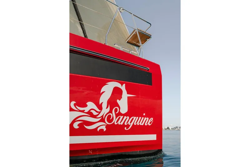 Slide: The Image of Red Privilege Signature 510 sailboat, 2025 model, featuring unicorn design. - 65