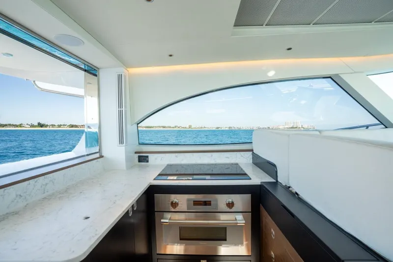 Slide: The Image of Modern kitchen interior on 2026 ECLIPSE 505 Shadow yacht with ocean view. - 11