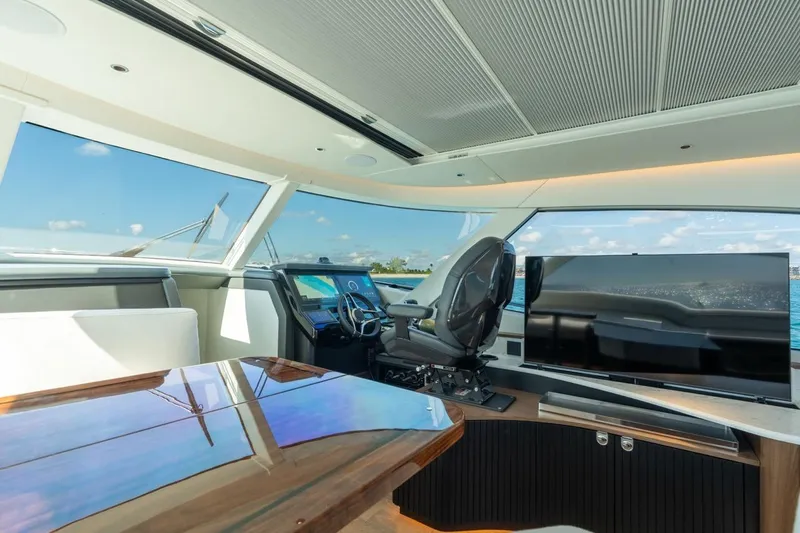 Slide: The Image of Interior of 2026 ECLIPSE 505 Shadow yacht with modern helm and panoramic windows. - 19