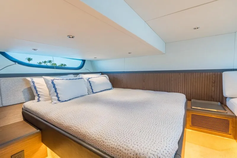 Slide: The Image of Luxurious interior cabin of 2026 ECLIPSE 505 Shadow yacht with cozy bedding. - 26