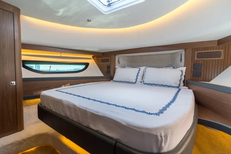 Slide: The Image of Luxurious bedroom interior of 2026 ECLIPSE 505 Shadow yacht with elegant bedding. - 30