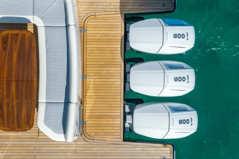 Slide: The Image of Aerial view of 2026 ECLIPSE 505 Shadow yacht with triple outboard engines. - 33