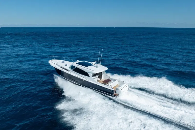 Slide: The Image of 2026 ECLIPSE 505 Shadow yacht cruising on open ocean waters. - 37