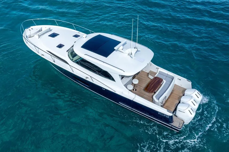 Slide: The Image of Luxury 2026 ECLIPSE 505 Shadow yacht cruising on clear blue water. - 39