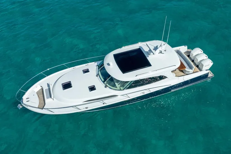 Slide: The Image of Aerial view of 2026 ECLIPSE 505 Shadow yacht on turquoise water. - 43