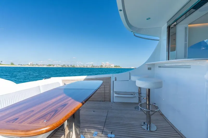 Slide: The Image of Luxury yacht deck with bar and seating, ECLIPSE 505 Shadow, 2026 model, ocean view. - 7