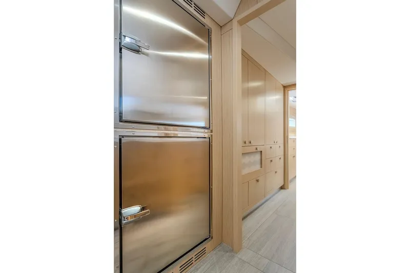 Slide: The Image of Interior of Privilege Signature 510 yacht, stainless steel appliances, modern design, year 2025. - 48