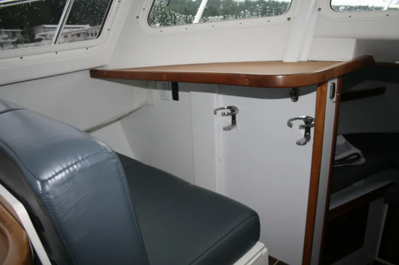 Slide: The Image of Stainless steel stove in 2019 Ocean Sport Roamer 30 yacht kitchen. - 19