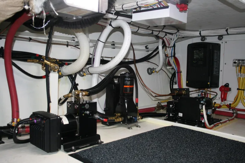 Slide: The Image of Electrical system inside 2019 Ocean Sport Roamer 30 boat, featuring Magnum Energy components. - 29