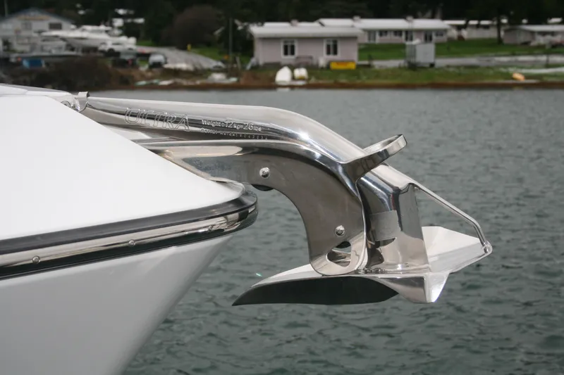 Slide: The Image of 2019 Ocean Sport Roamer 30 boat with covered equipment on top deck. - 4