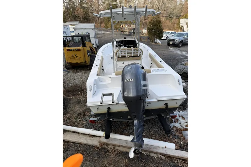 Slide: The Image of 2016 Sportsman Open 212 Center Console boat with Yamaha 150 outboard motor. - 3