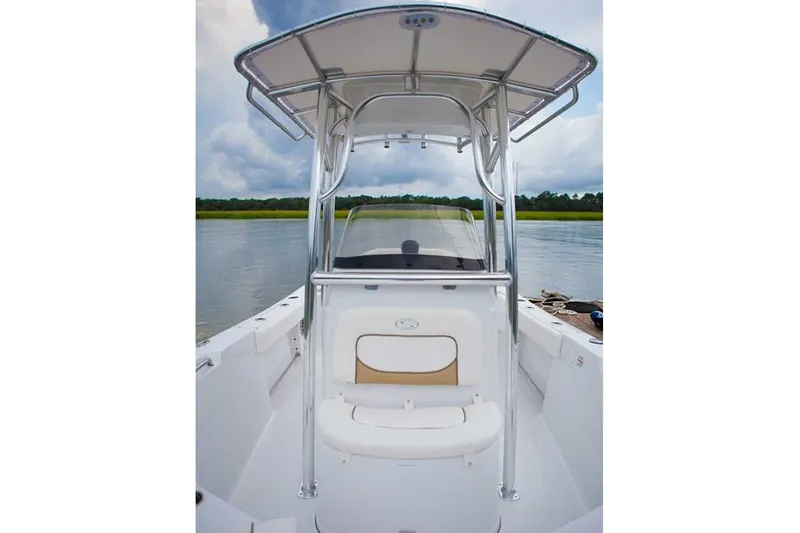 Slide: The Image of Manufacturer Provided Image: 2016 Sportsman Open 212 Center Console boat on calm water. - 9