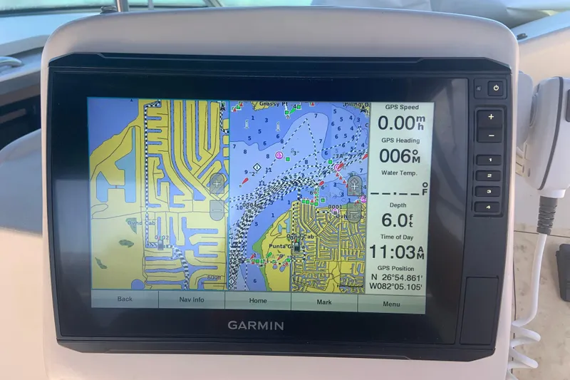 Slide: The Image of Garmin GPS display on 1998 Cruisers 3375 Espirit, showing navigation map and data. - 18