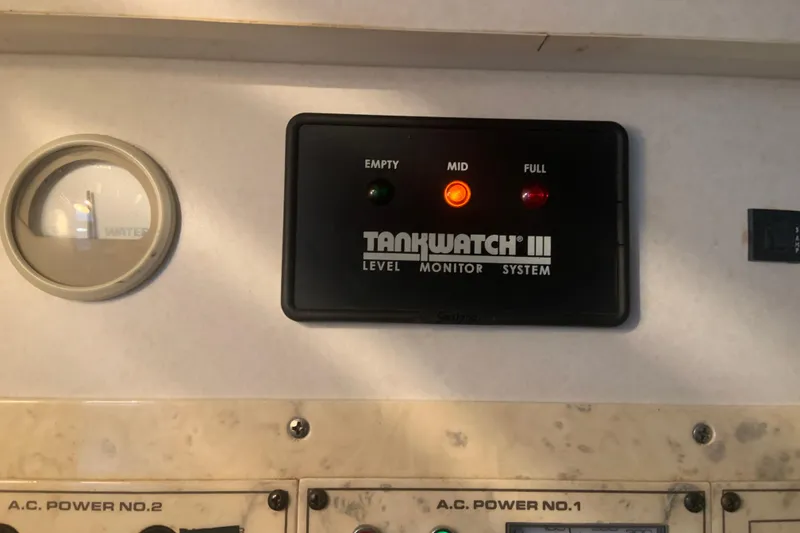 Slide: The Image of TankWatch III level monitor system on 1998 Cruisers 3375 Espirit boat dashboard. - 29