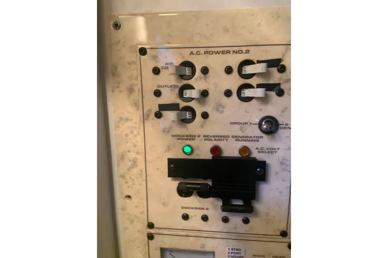Slide: The Image of 1998 Cruisers 3375 Espirit electrical panel with switches and indicators. - 31
